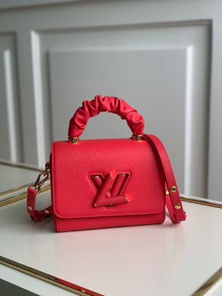 Pre-Loved LV Twist PM Ginger Yellow