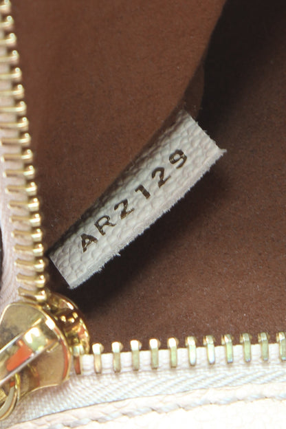 Louis Vuitton Pochette Metis Monogram Empreinte Neige Ivory